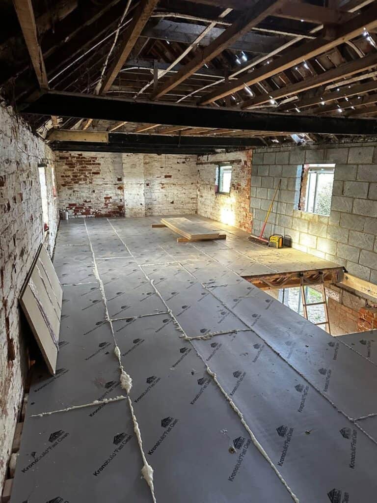 Timber frame and pozi-joists retro fitted to brick building