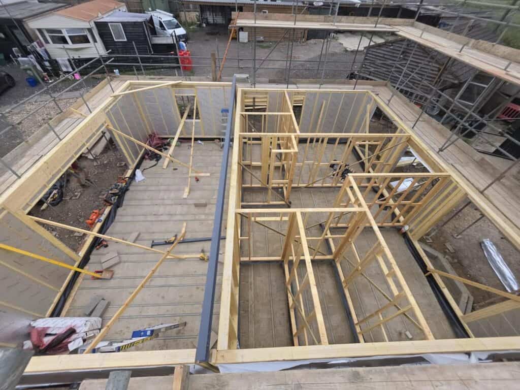 Inside a timber frame building being constructed