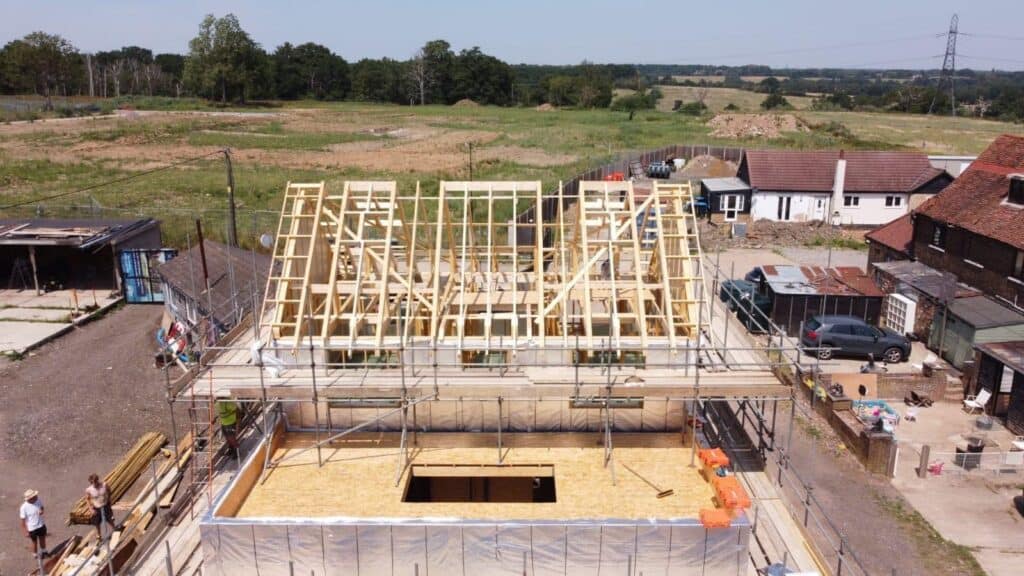 Timber frame building with Posi-Joists and roof trusses