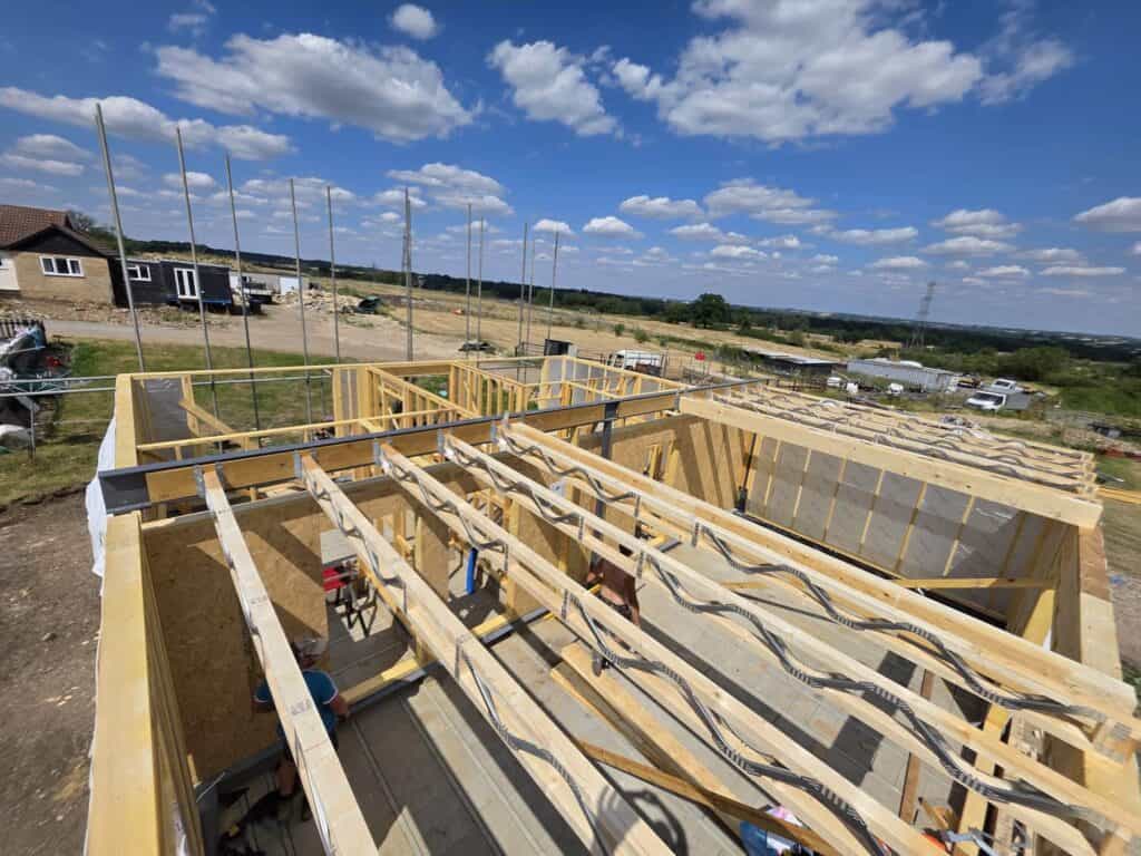 Timber frame building with Posi-Joists