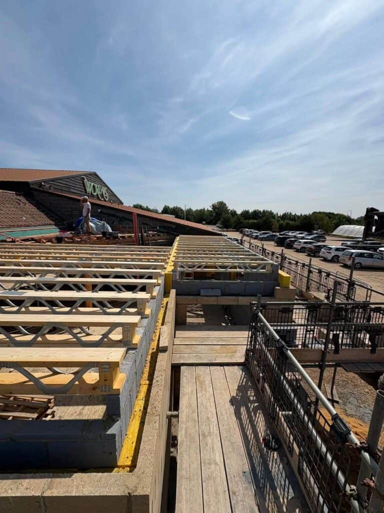 Timber joists being installed