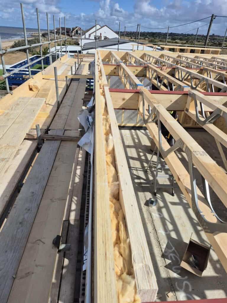 Timber joists being installed